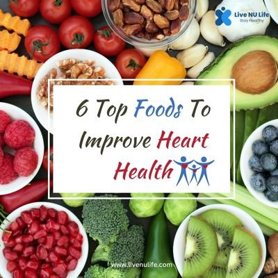 6 Top Foods To Improve Heart Health | Fresh fruits, vegetables, nuts, and salmon arranged as heart-healthy foods on a wooden table